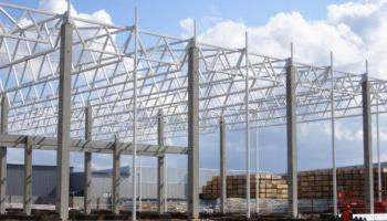 An Image Of A Large Steel Frame Around Which A Metal Building Will Be Constructed.